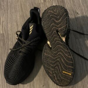 adidas Black Sneakers with Gold Accent Stripes